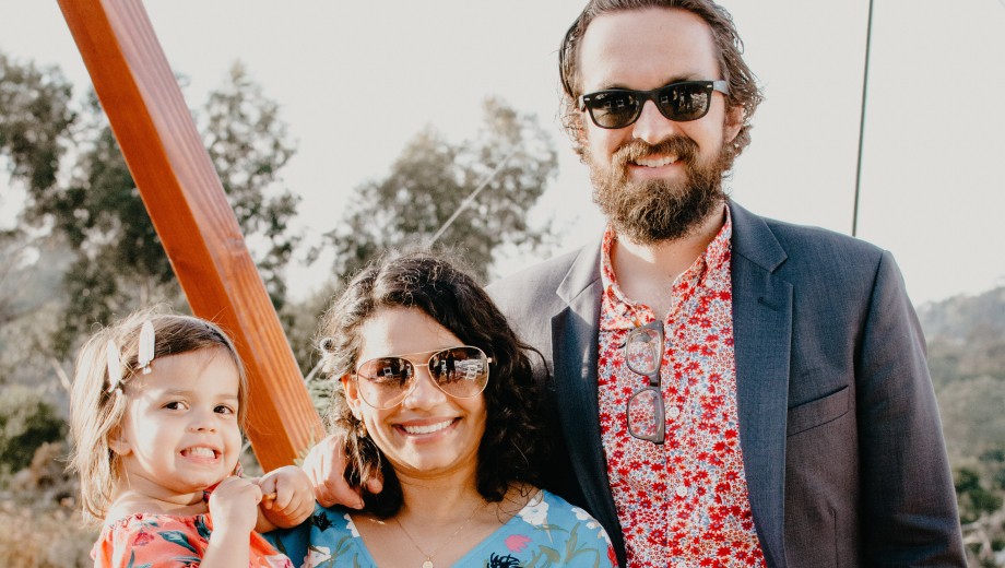 Chandani Patel, PhD'15, and Brady Smith, AM'09, PhD'15, with their daughter, Aashna