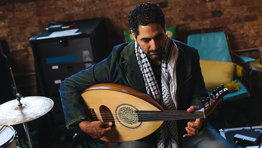 Ronnie Malley, AM'23, plays the oud, a Middle Eastern ancestor of the guitar.