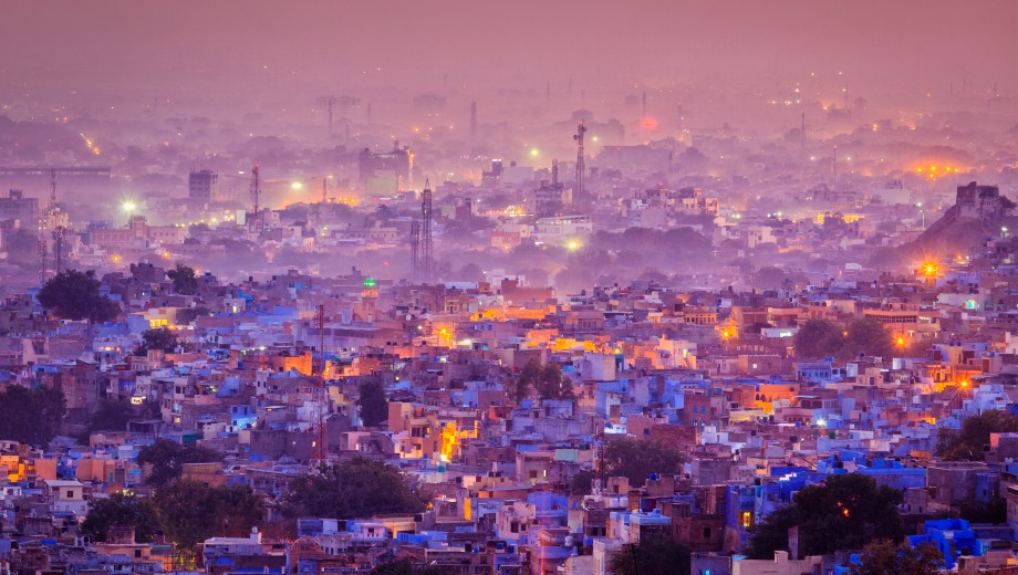 Aerial view of Jodhpur, India, at night. Ayres has tracked the rise of India on the global stage.